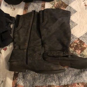 Boots up to mid knee. Hardly worn.